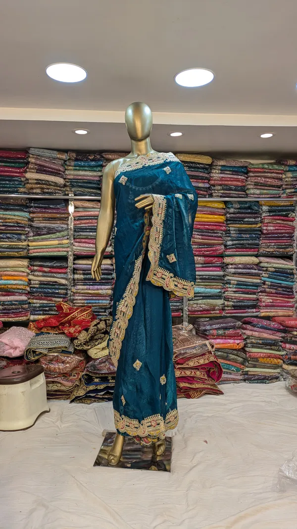 Teal_Blue_Fendi_Saree_With_Embroidered_Zari_Border_And_Embellished_Pallu