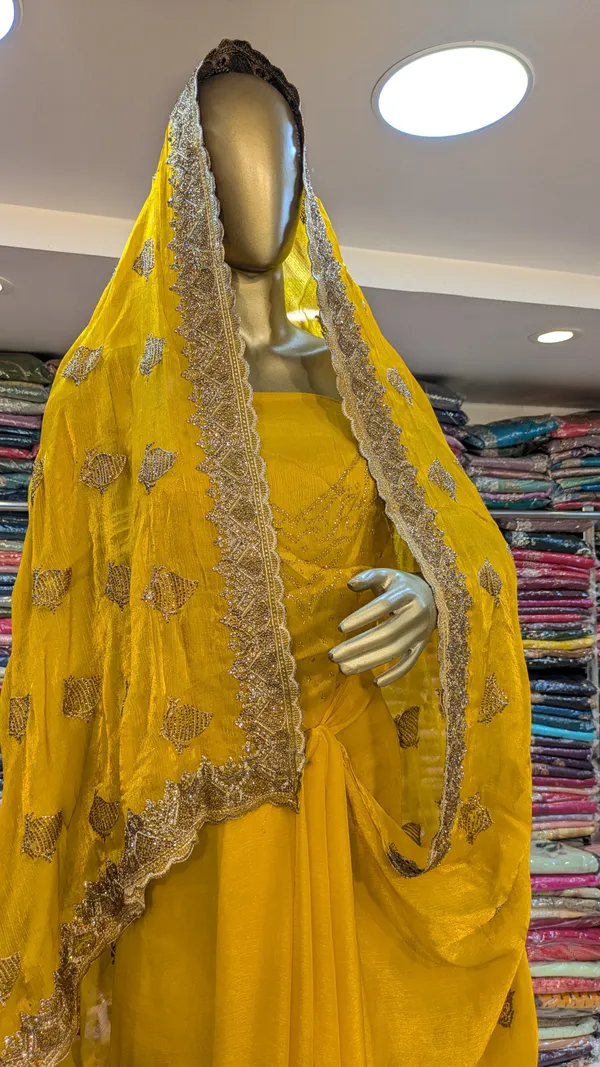 Yellow_Georgette_Saree_With_Embellishments_And_Dupatta