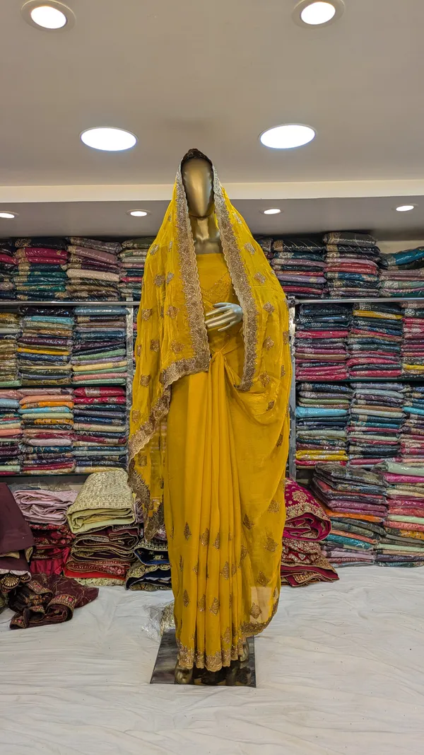 Yellow_Georgette_Saree_With_Embellishments_And_Dupatta