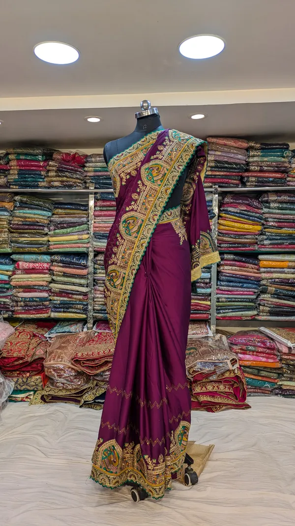 Purple_Satin_Silk_Saree_With_Multicolor_Peacock_Border