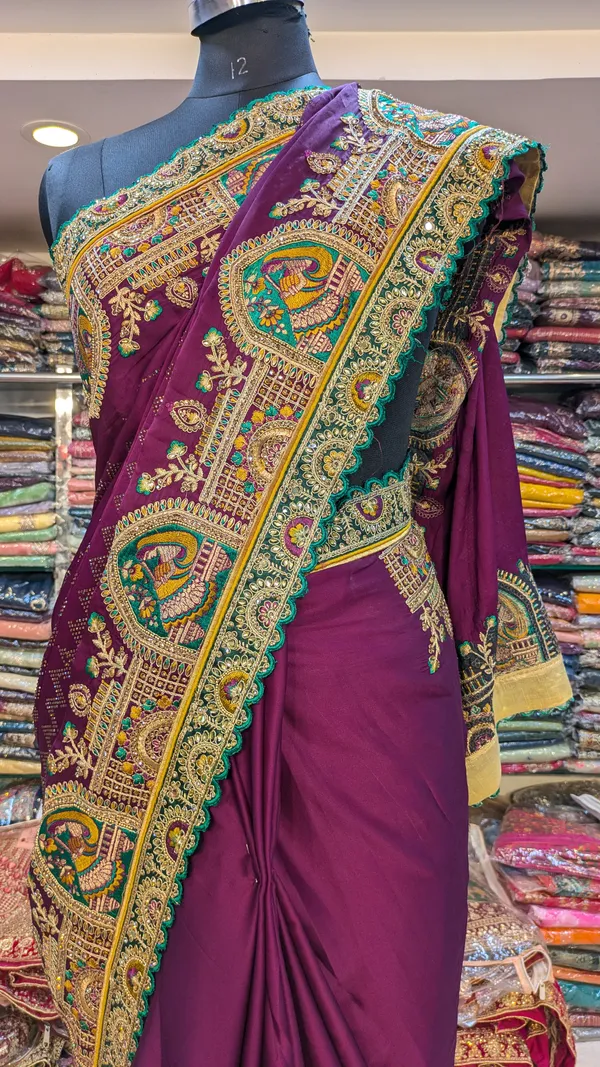 Purple_Satin_Silk_Saree_With_Multicolor_Peacock_Border