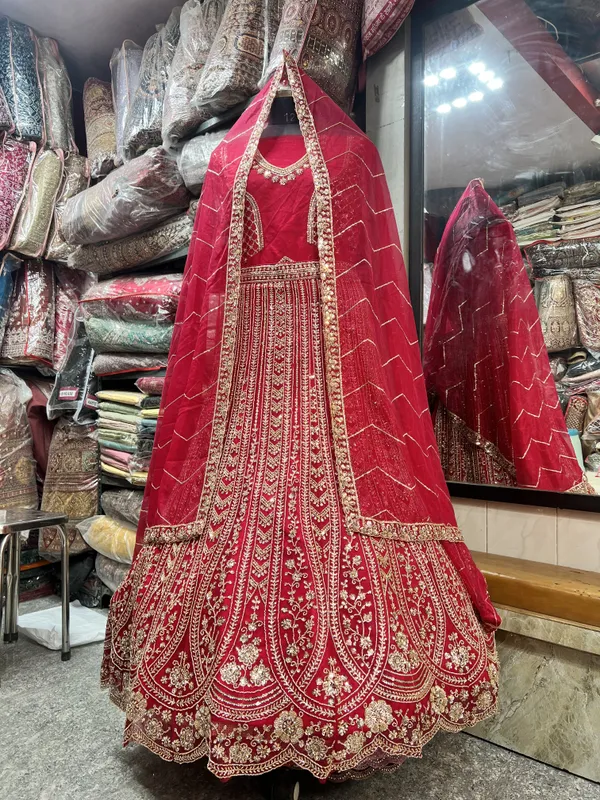 Red_Net_Bridal_Lehenga_Choli_Set_With_Heavy_Embroidery
