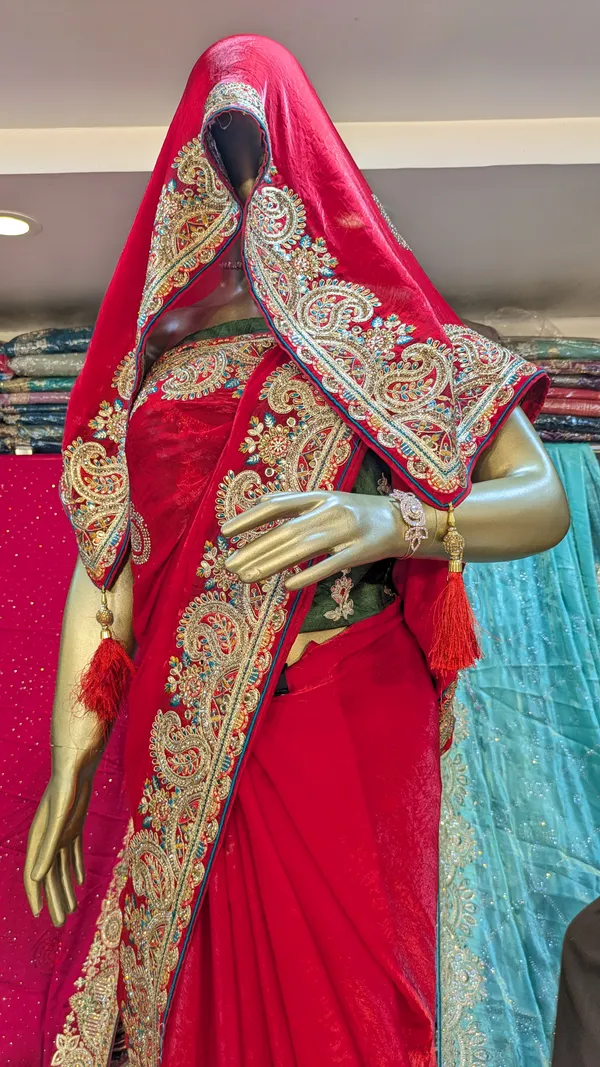 Red_Satin_Silk_Saree_With_Heavy_Paisley_Border