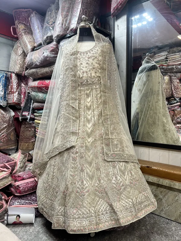 Ivory_Net_Bridal_Lehenga_Choli_Set_With_Floral_Embroidery
