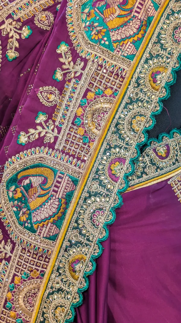 Purple_Satin_Silk_Saree_With_Multicolor_Peacock_Border
