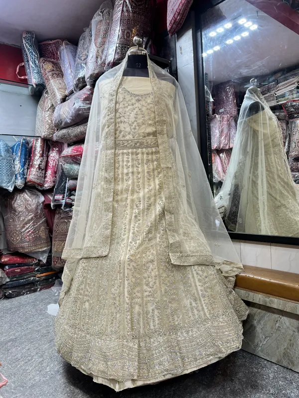 Off-White_Net_Bridal_Lehenga_Choli_Set_With_Silver_Embroidery