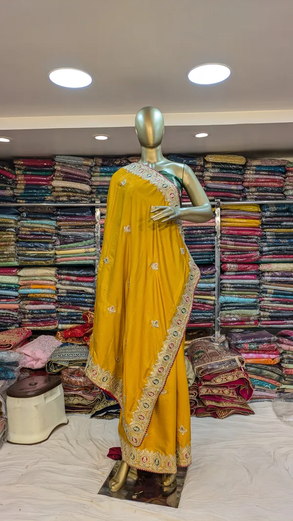 Yellow_Silk_Saree_With_Ornate_Embroidered_Border