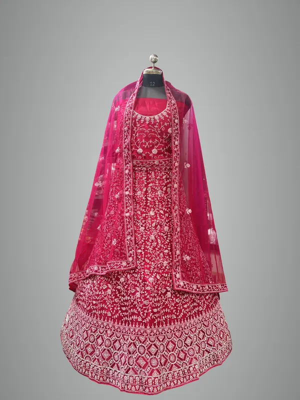 Magenta_Pink_Net_Bridal_Lehenga_Choli_Set_With_Heavy_Embroidery