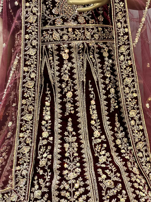 Maroon_Velvet_Bridal_Lehenga_Choli_Set_With_Golden_Zari_Work