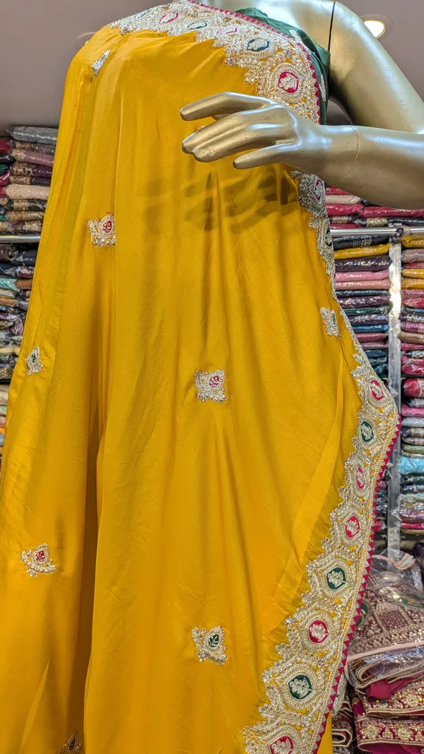 Yellow_Silk_Saree_With_Ornate_Embroidered_Border