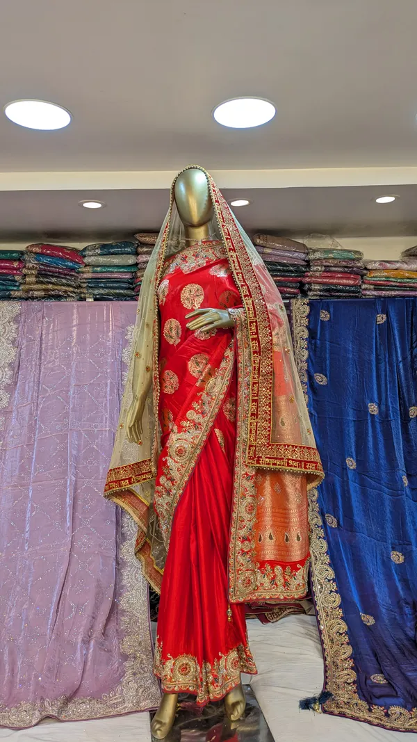 Red_Silk_Bridal_Saree_With_Heavy_Embroidered_Border_And_Pallu