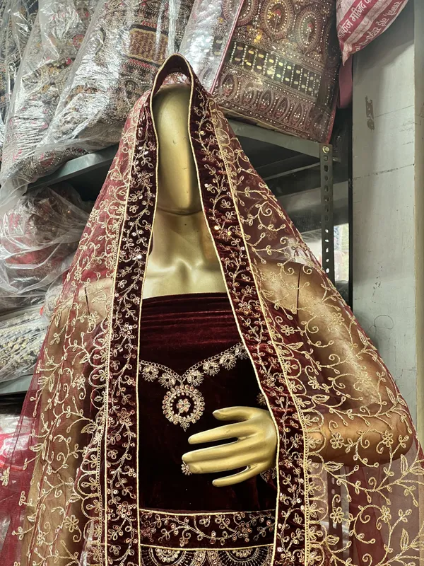 Maroon_Velvet_Bridal_Lehenga_Choli_Set_With_Heavy_Embellishments