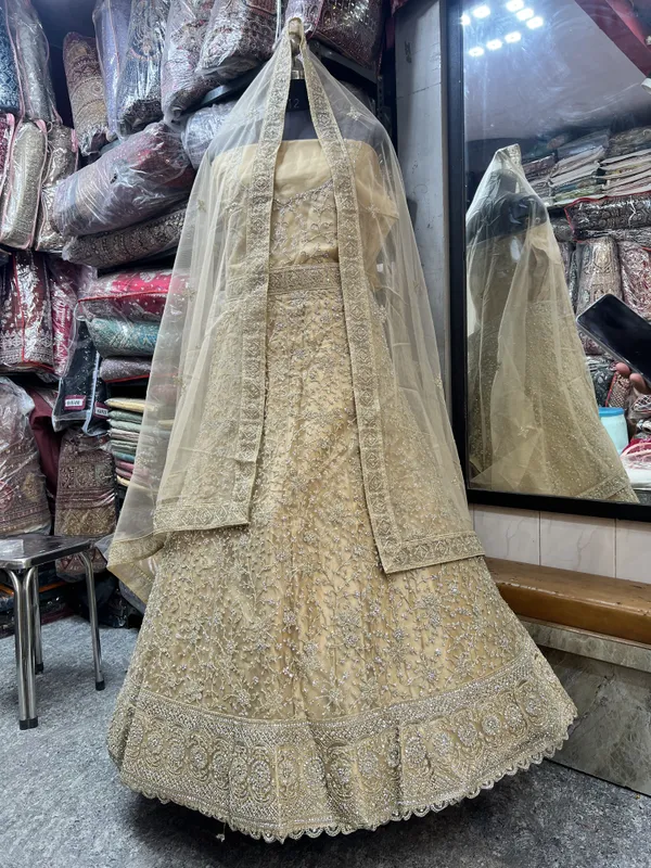 Gold_Net_Bridal_Lehenga_Choli_Set_With_Embroidery_And_Dupatta