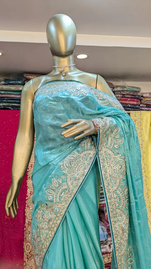 Turquoise_Fendi_Saree_With_Silver_Zari_Border