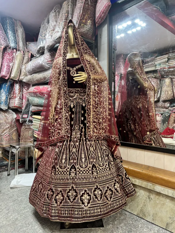 Maroon_Velvet_Bridal_Lehenga_Choli_Set_With_Heavy_Embellishments
