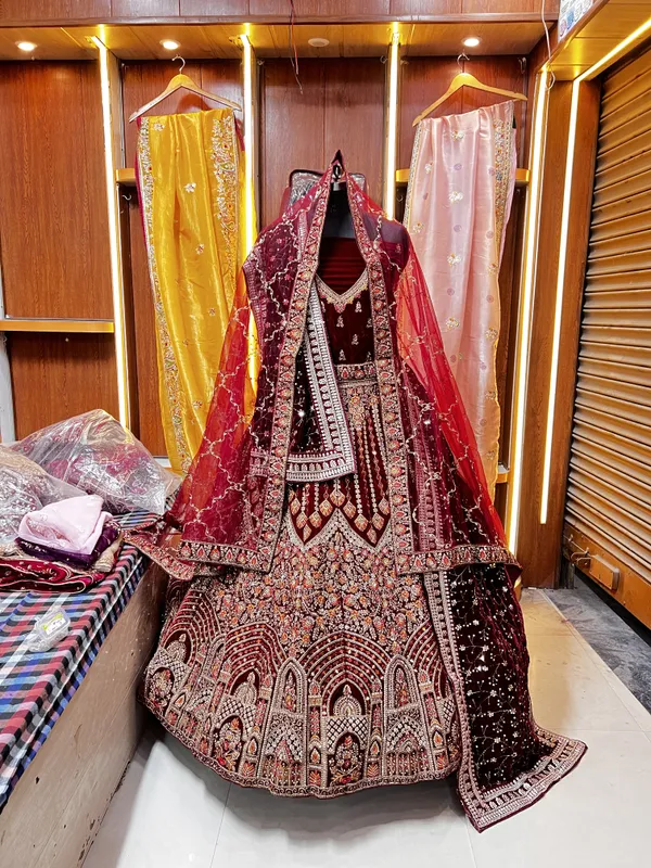 Maroon_Velvet_Bridal_Lehenga_Choli_Set_With_Heavy_Embroidery_And_Dupatta