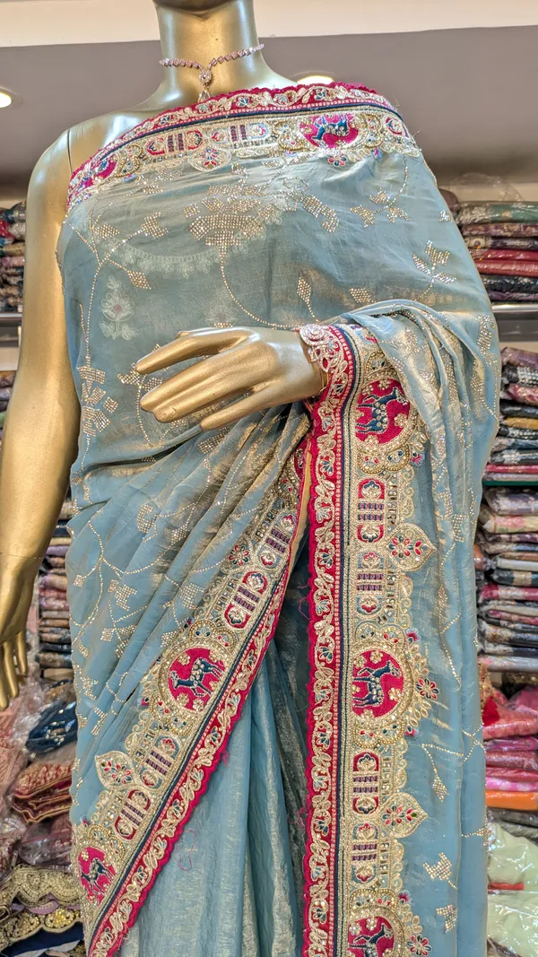 Blue_Fendi_Silk_Saree_With_Embellished_Border