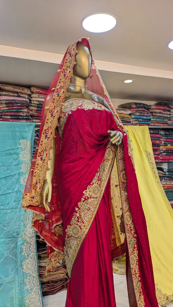 Red_Kanjivaram_Silk_Bridal_Saree_With_Heavy_Embroidered_Border
