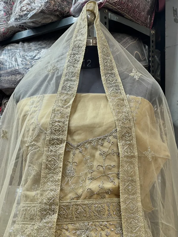 Gold_Net_Bridal_Lehenga_Choli_Set_With_Embroidery_And_Dupatta