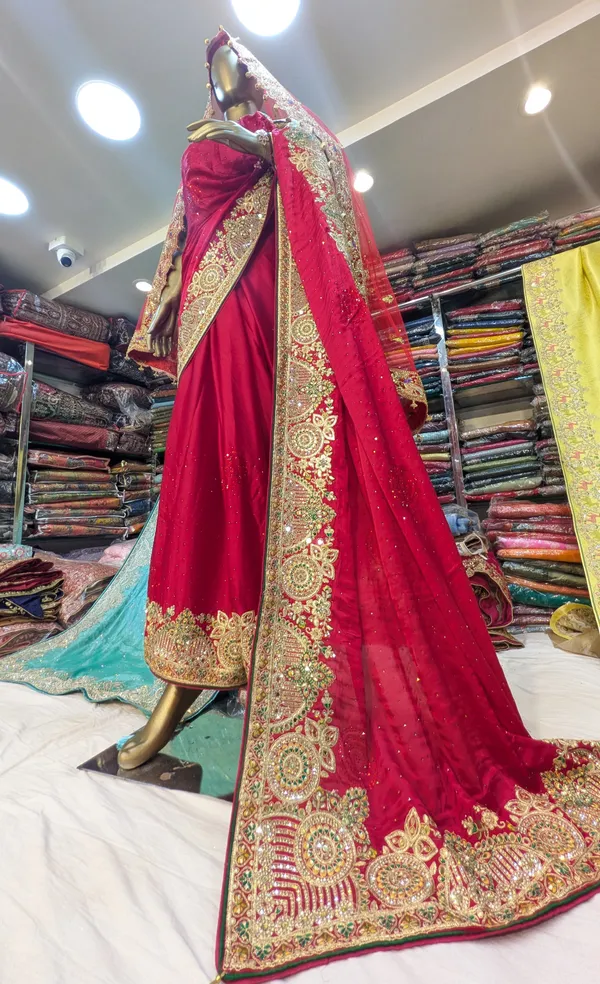 Red_Kanjivaram_Silk_Bridal_Saree_With_Heavy_Embroidered_Border
