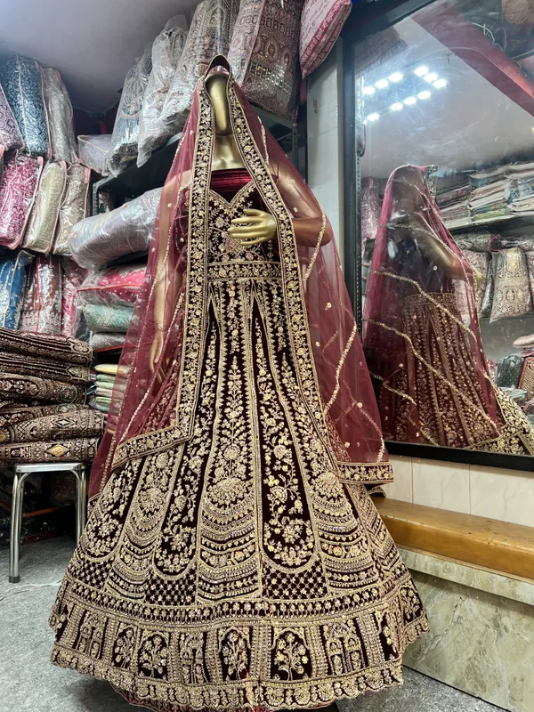 Maroon_Velvet_Bridal_Lehenga_Choli_Set_With_Golden_Zari_Work