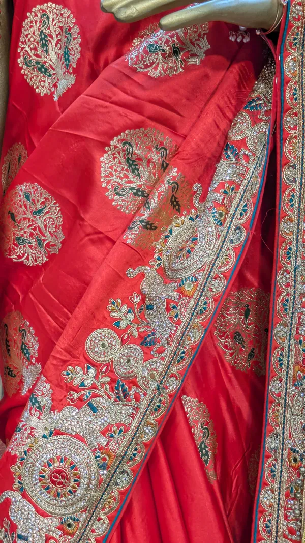 Red_Silk_Bridal_Saree_With_Heavy_Embroidered_Border_And_Pallu