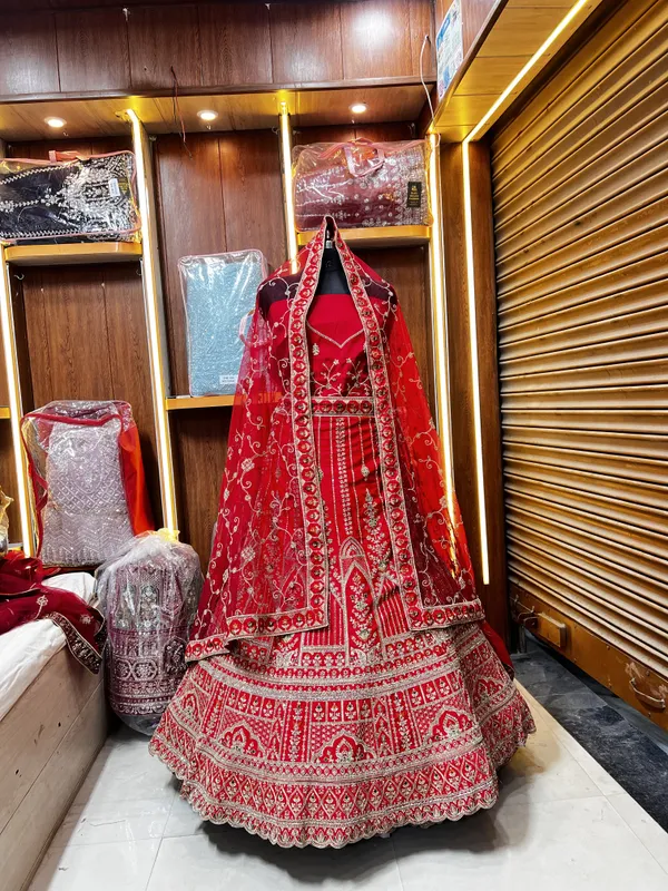 Red_Silk_Bridal_Lehenga_Choli_Set_With_Heavy_Embroidery_And_Dupatta
