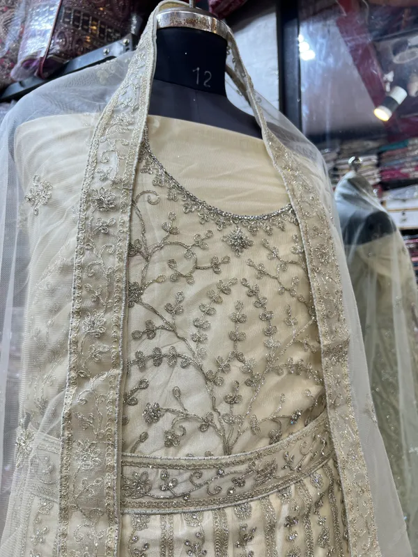 Off-White_Net_Bridal_Lehenga_Choli_Set_With_Silver_Embroidery