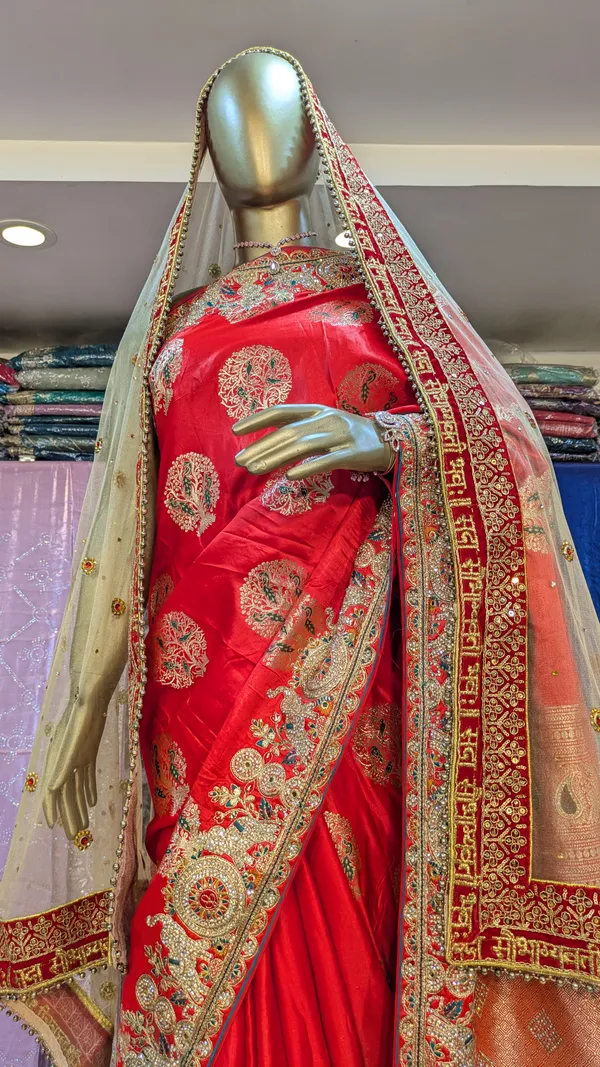 Red_Silk_Bridal_Saree_With_Heavy_Embroidered_Border_And_Pallu