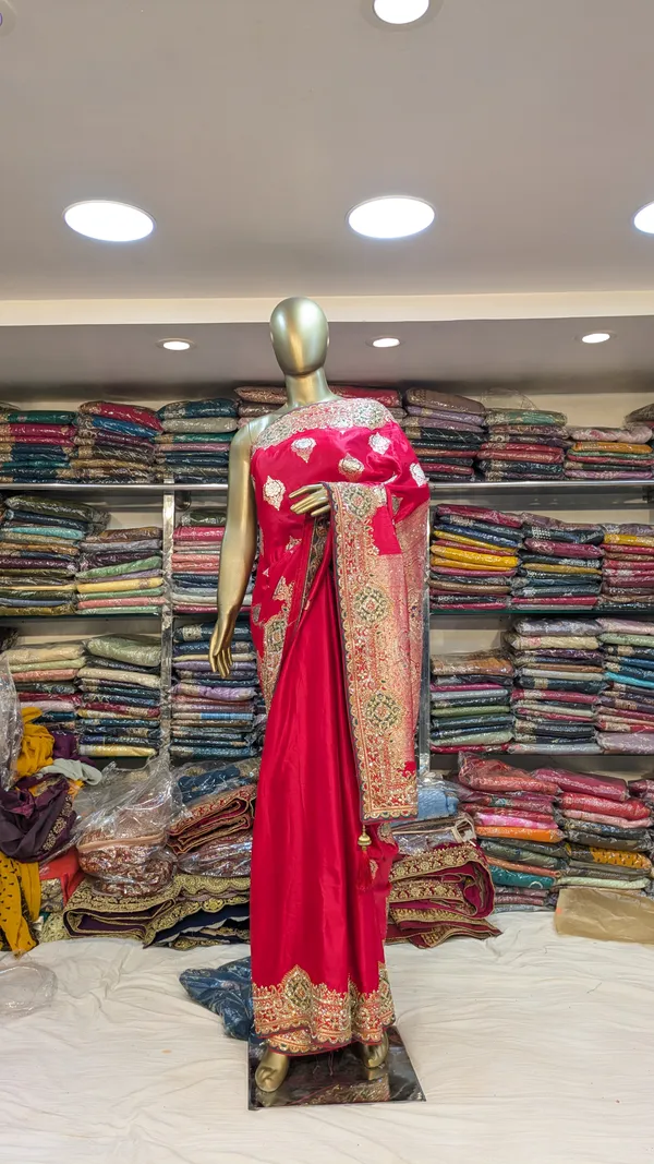Red_Silk_Saree_With_Golden_Zari_And_Silver_Embroidery