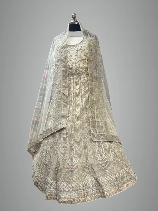 Ivory_Net_Bridal_Lehenga_Choli_Set_With_Floral_Embroidery