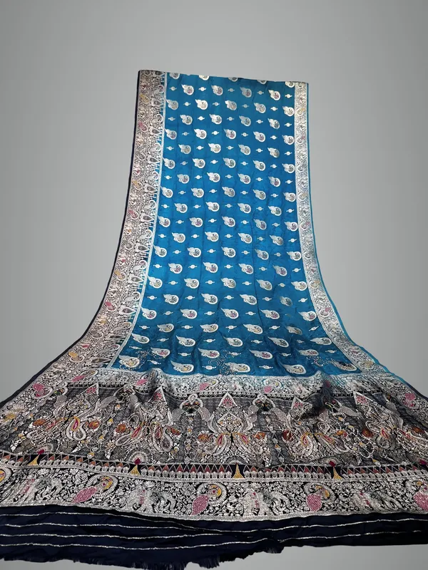 Traditional_Blue_Kalamkari_Silk_Saree_With_Paisley_Motifs_And_Contrast_Border