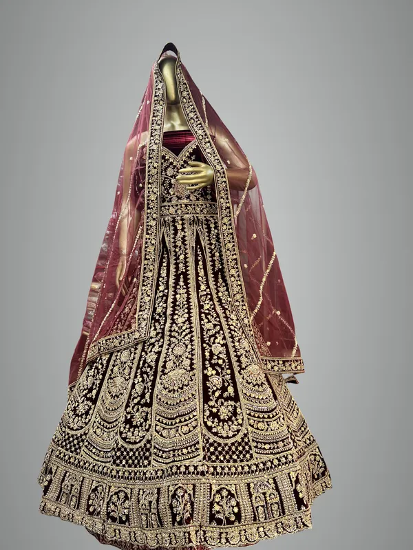 Maroon_Velvet_Bridal_Lehenga_Choli_Set_With_Golden_Zari_Work