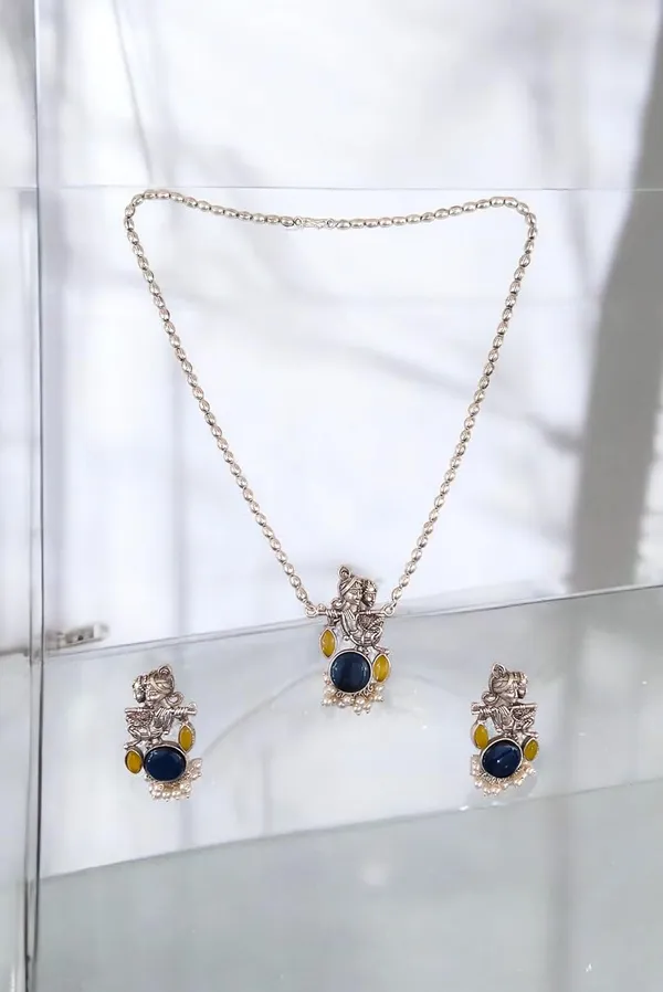 Yellow_German_Silver_Radha_Krishna_Necklace_And_Earrings_Set_For_Women
