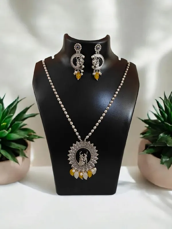 Yellow_German_Silver_Necklace_Set_With_Radha_Krishna_Pendant_And_Earrings_For_Women