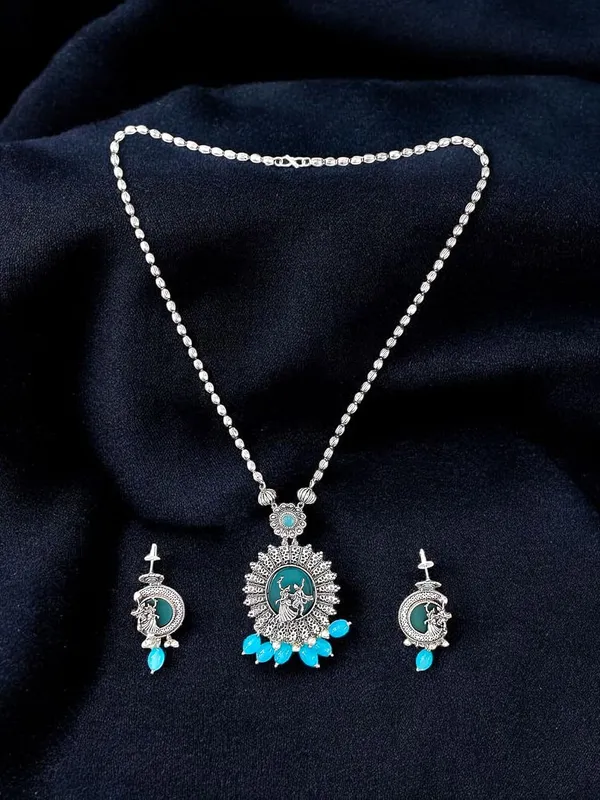 Turquoise_German_Silver_Necklace_Set_With_Radha_Krishna_Pendant_And_Earrings_For_Women