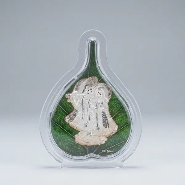 999_Silver_Radha_Krishna_Idol_In_Acrylic_Frame_With_Green_Base