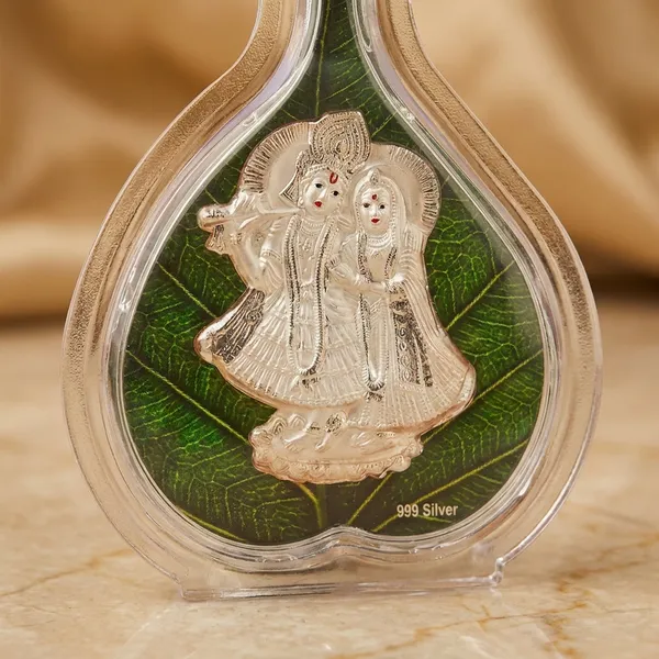 999_Silver_Radha_Krishna_Idol_In_Acrylic_Frame_With_Green_Base