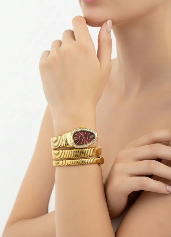 Gold_Tone_Snake_Coil_Bracelet_Watch_With_Red_Dial