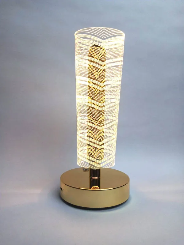 Golden_Cylindrical_LED_Table_Lamp_with_Decorative_Pattern