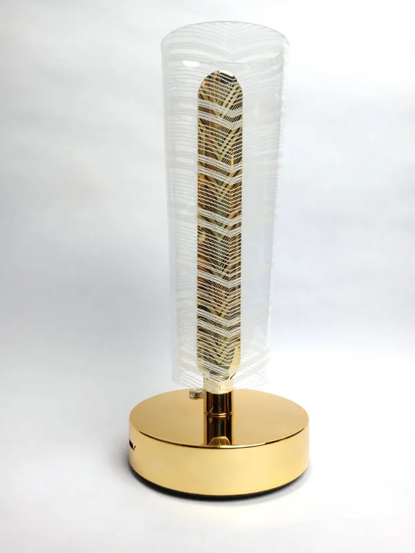 Golden_Cylindrical_LED_Table_Lamp_with_Decorative_Pattern