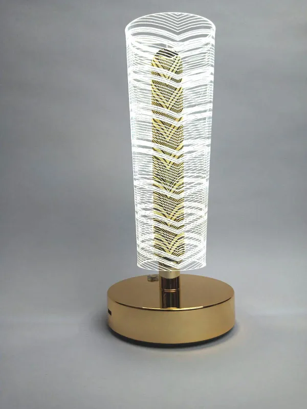 Golden_Cylindrical_LED_Table_Lamp_with_Decorative_Pattern
