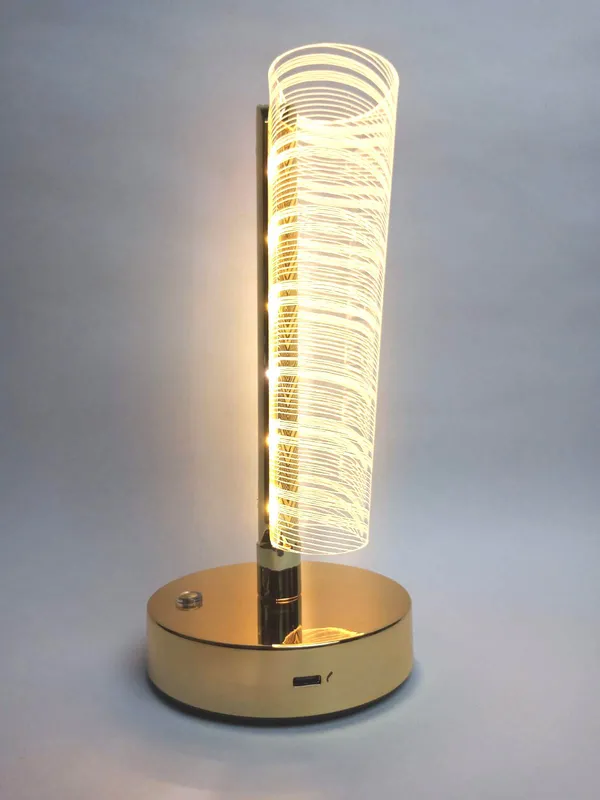 Golden_Cylindrical_LED_Table_Lamp_with_Decorative_Pattern