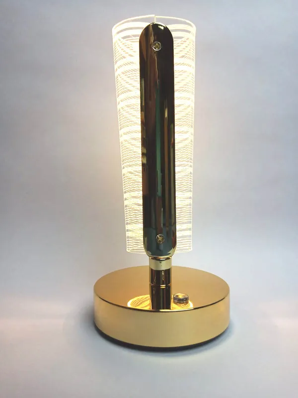 Golden_Cylindrical_LED_Table_Lamp_with_Decorative_Pattern