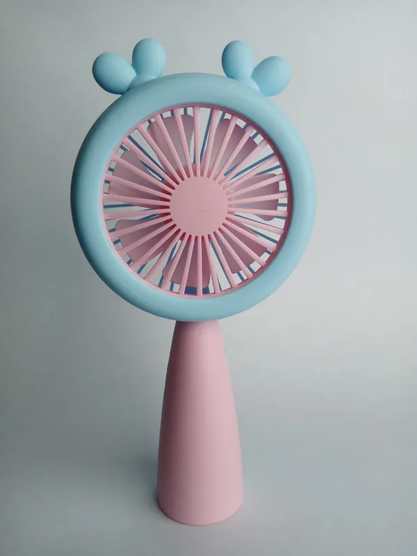 Blue_and_Pink_Handheld_Portable_Battery_Fan_with_Cartoon_Design
