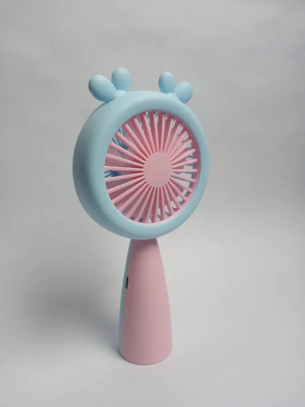 Blue_and_Pink_Handheld_Portable_Battery_Fan_with_Cartoon_Design