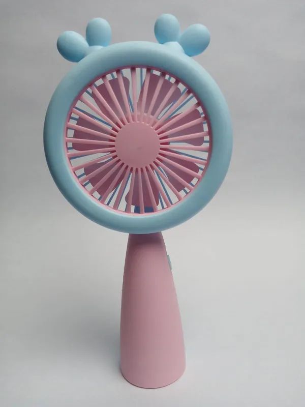 Blue_and_Pink_Handheld_Portable_Battery_Fan_with_Cartoon_Design