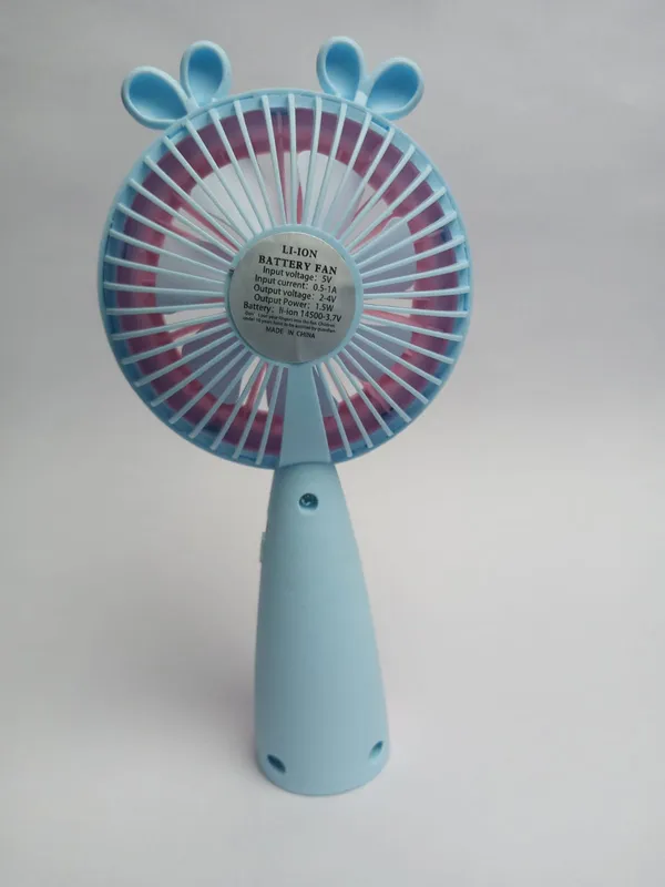 Blue_and_Pink_Handheld_Portable_Battery_Fan_with_Cartoon_Design