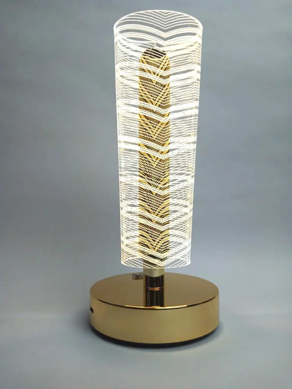 Golden_Cylindrical_LED_Table_Lamp_with_Decorative_Pattern