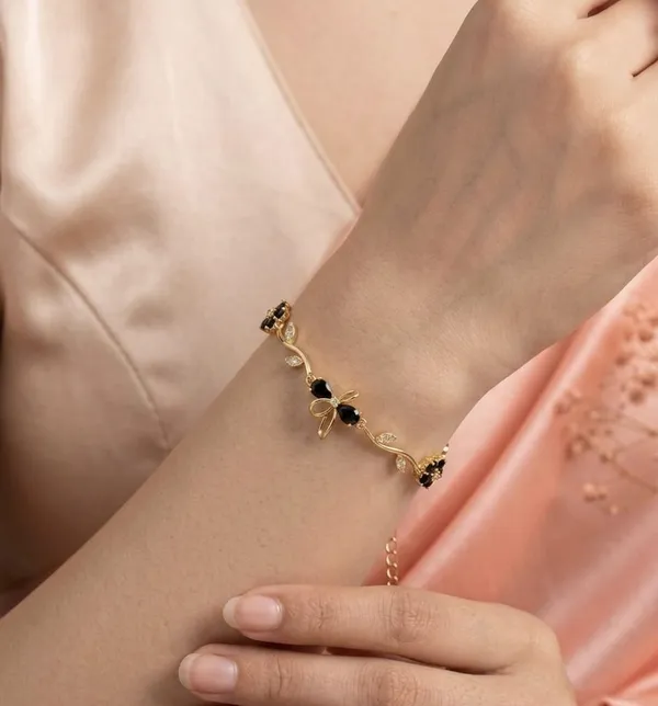 Midnight_Bloom:_Black_Floral_Gold_Tulip_Bracelet